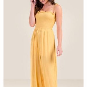 Yellow flowy jumpsuit Francesca’s NWT